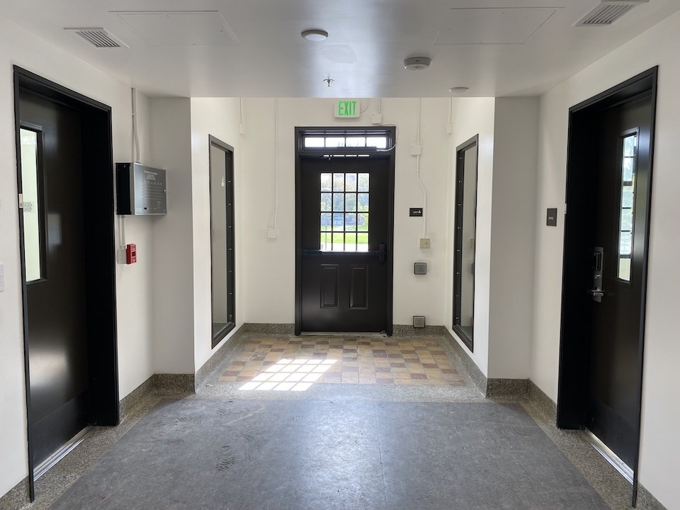Building 205 interior main lobby, showing rehabilitated entryway tile, 